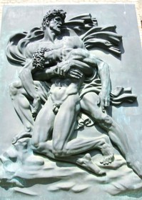 relief of soldier holding fallen comrade