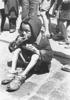 Starving child in Warsaw