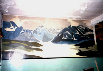 photograph of snowy mountain scene mural in Dachau, taken Aug. 2000